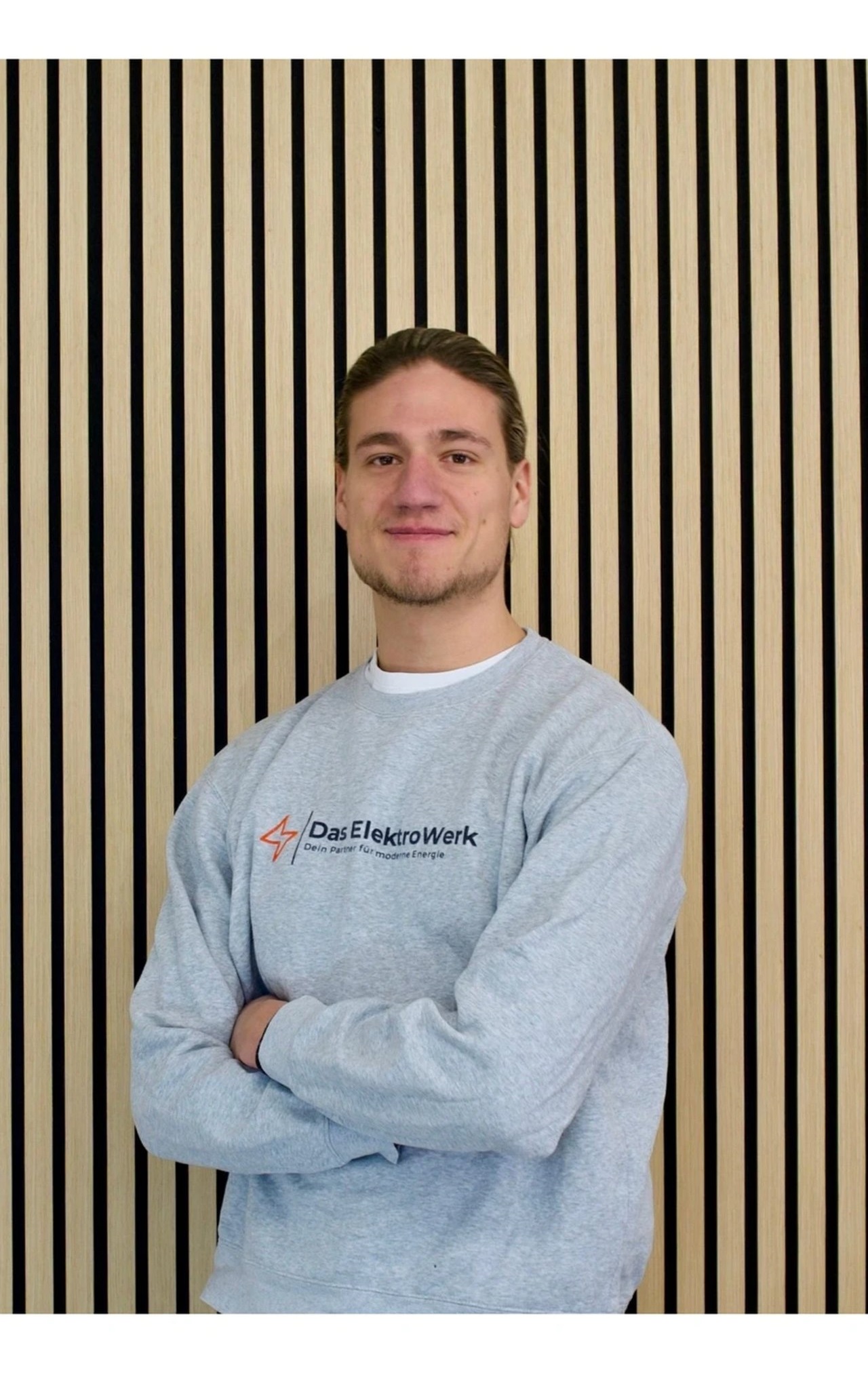 Portraitfoto von Dennis, Monteur
